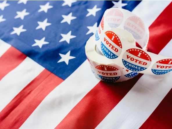 US election badges and US flag